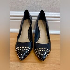 BCBGeneration Black Pointed-Toe Flats with Gold Studs